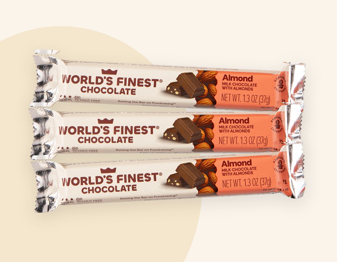 Three World's Finest Chocolate Almond bars, milk chocolate with almonds, 1.3 oz each, sold by the 40-count box at Jimenez Ranch Market